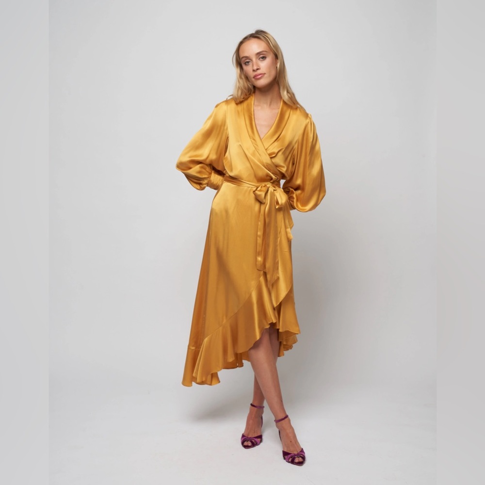 Zimmerman wrap dress in Gold size 2 Worn once for 2 hrs. Excellent condition